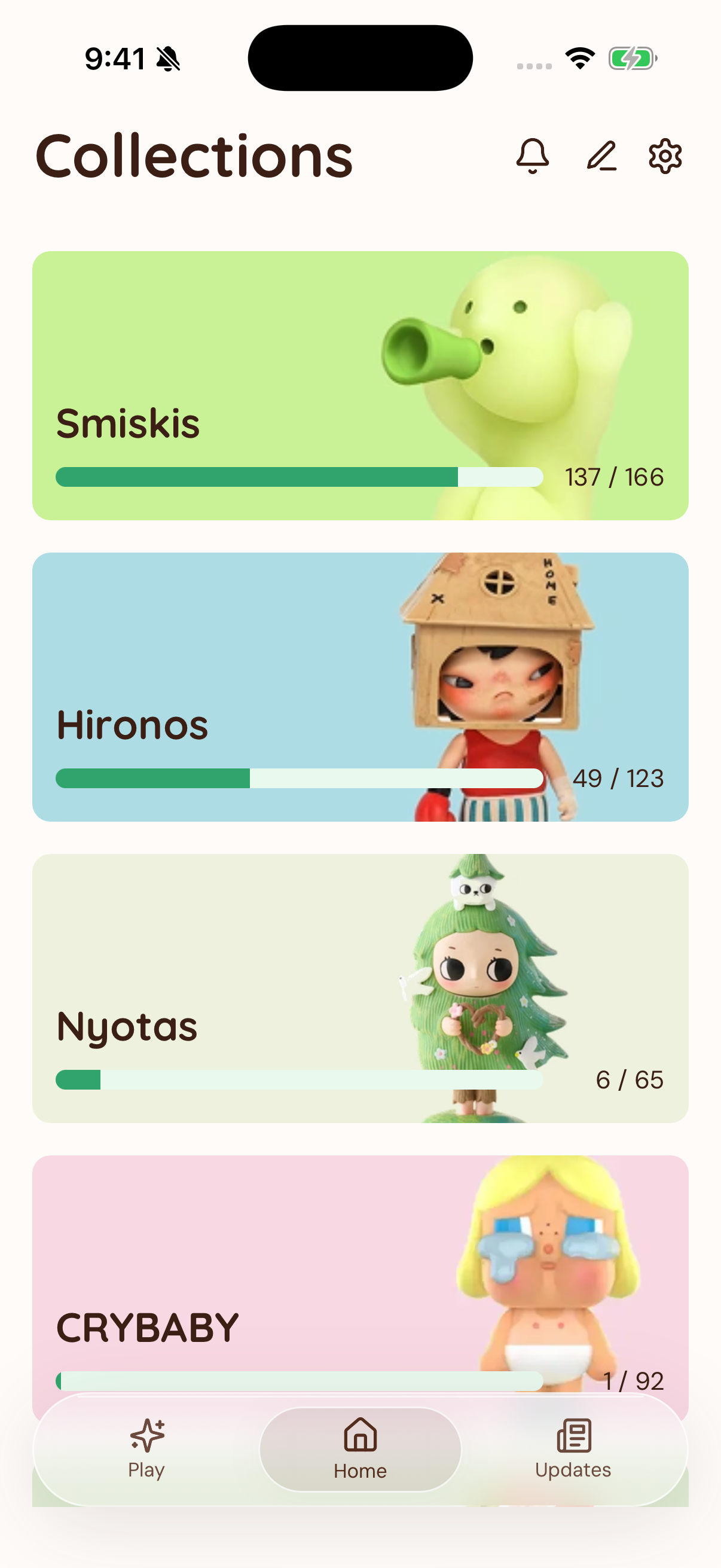The Blind Box Tracker app showing owned figure counts and collection progress.